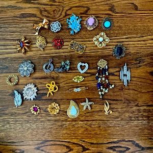 28 brooches